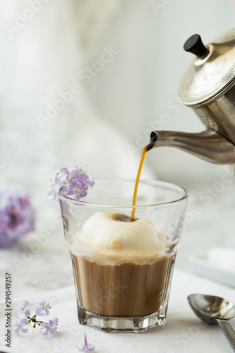Cup of glace coffee with ice cream © Maria