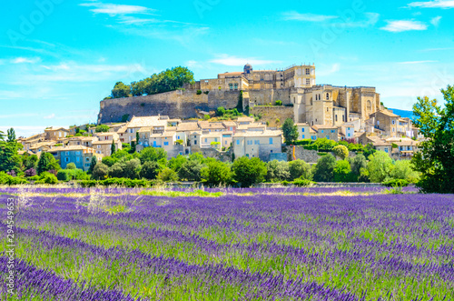 Lavender fields at village Gordes, a small medieval town in Provence, Travel destination in France. photo