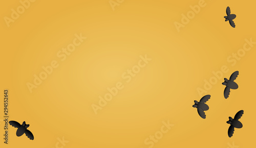 Halloween Karte mit Fledermäusen auf orangefarbigen Hintergrund photo