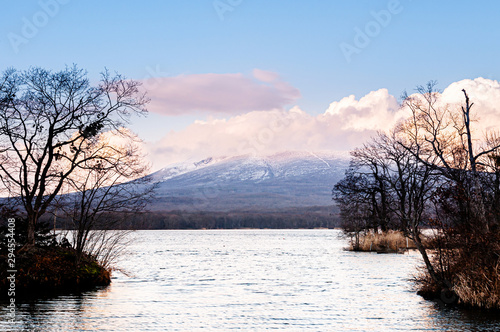 Onuma Koen Quasi -National park lake in peaceful cold winter with mountain view. Hakodate  Hokkaido - Japan