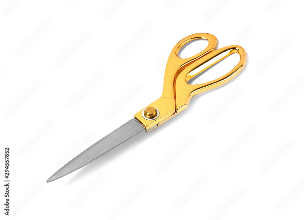 New sharp gold scissors on white background New sharp gold scissors on white background