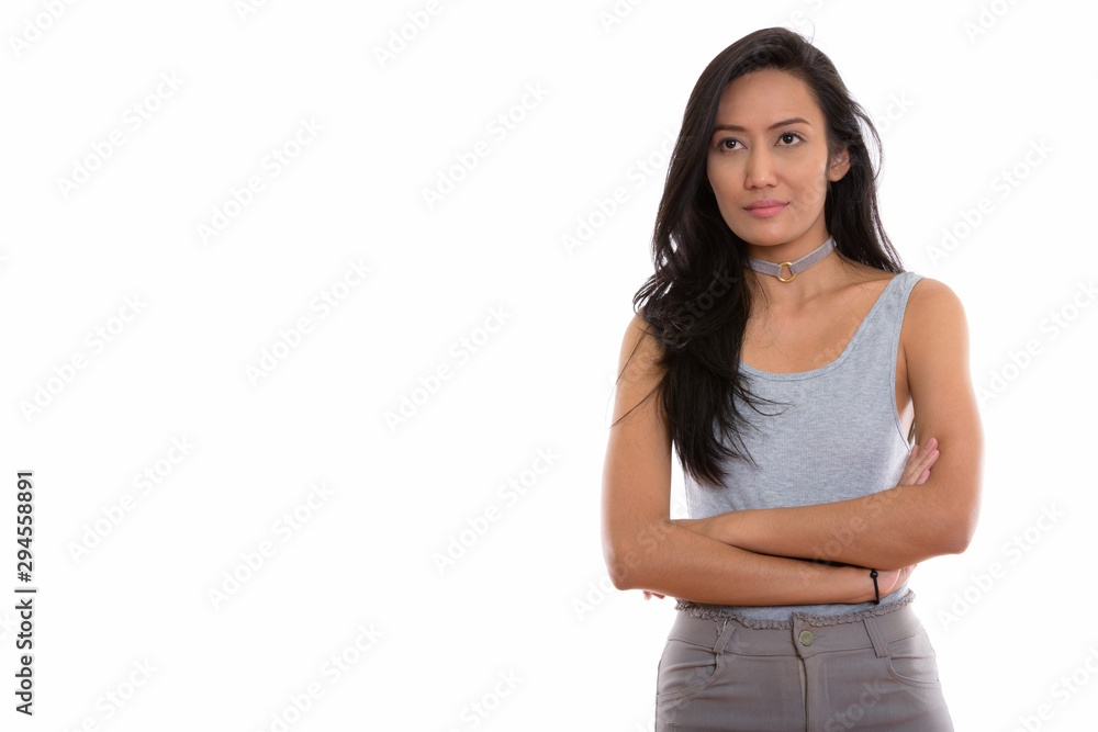 Studio shot of young beautiful Asian woman Studio shot of young beautiful Asian woman