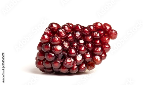 ripe pomegranate berries on a white background