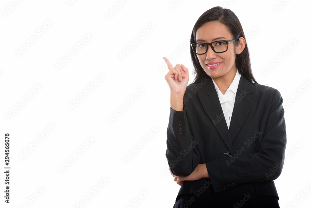 Studio shot of young beautiful Asian businesswoman Studio shot of young beautiful Asian businesswoman