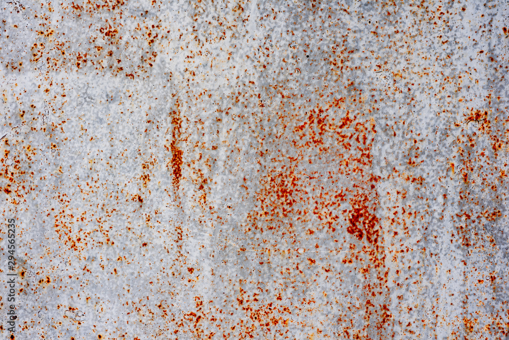 Metal texture with scratches and cracks which can be used as a background Metal texture with scratches and cracks which can be used as a background
