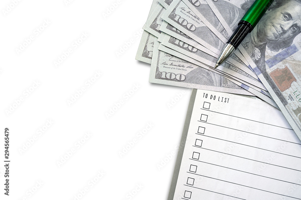 Reminder note to do list with dollars bank note and pen on white background. Reminder note to do list with dollars bank note and pen on white background.