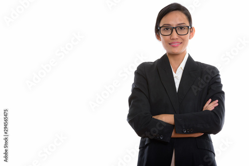 Studio shot of young beautiful Asian businesswoman