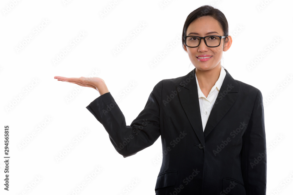 Studio shot of young beautiful Asian businesswoman Studio shot of young beautiful Asian businesswoman