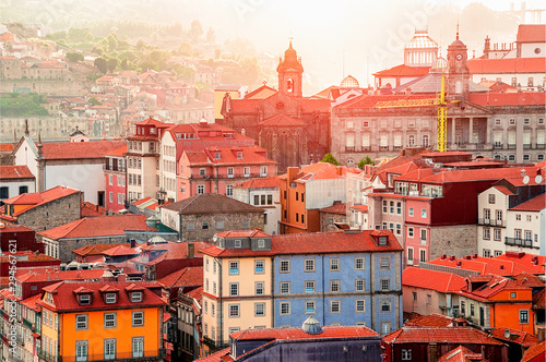 Porto, Portugal suny old town ribeira with colorful houses, Douro river. Sunset aerial perspective landmark.