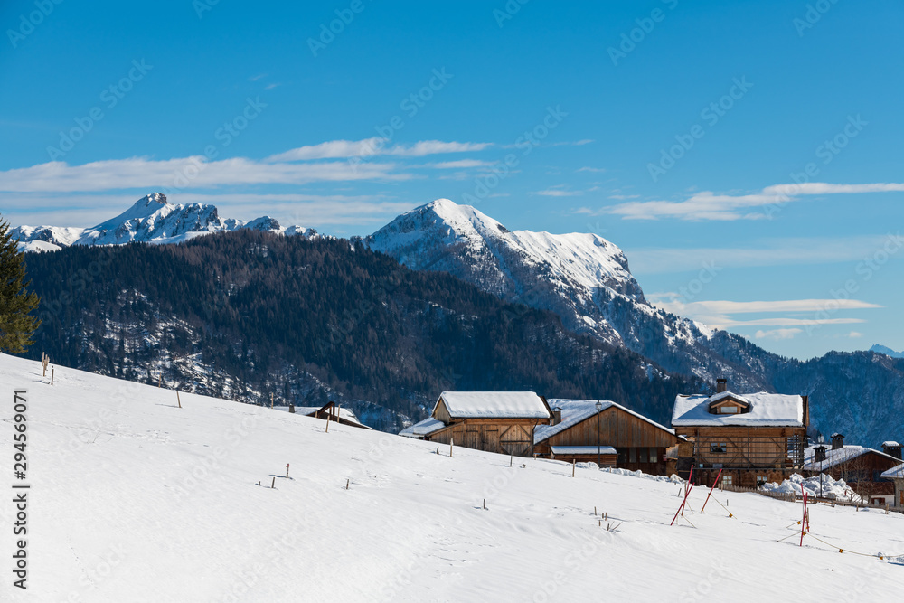Winter magic. The ancient wooden houses of Sauris di Sopra. Italy