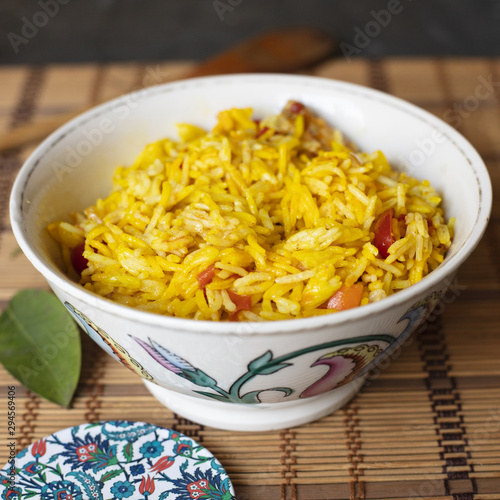 Bowl of rice with tomatoes close-up