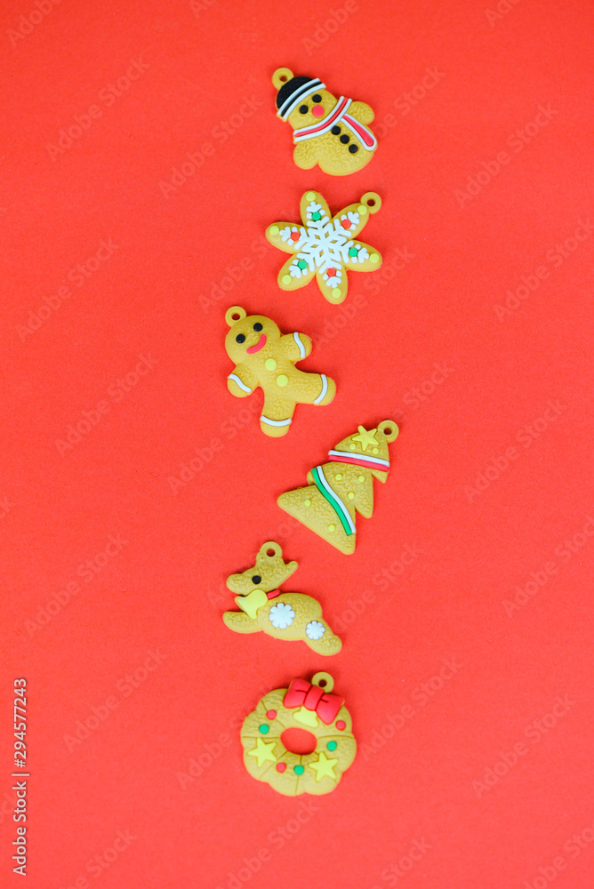 Christmas on red background / christmas decoration pine tree reindeer snowman ginger bread xmas winter and Happy New Year object holiday concept , top view