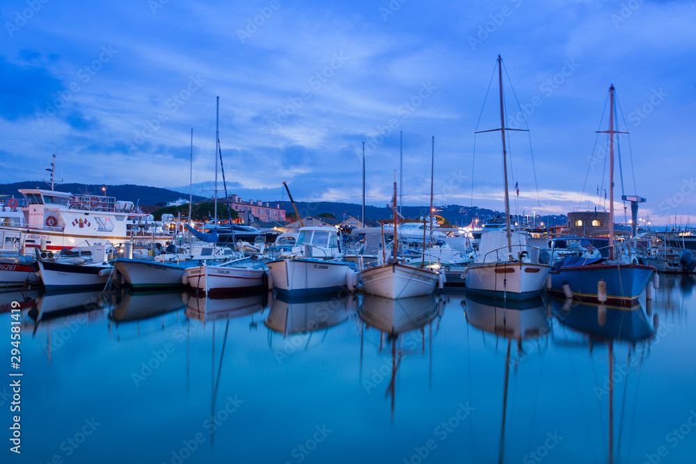 Boats in the port of Saint Tropez in the evening, Var, Provence-Alpes-Cote d'Azur, France, Europe