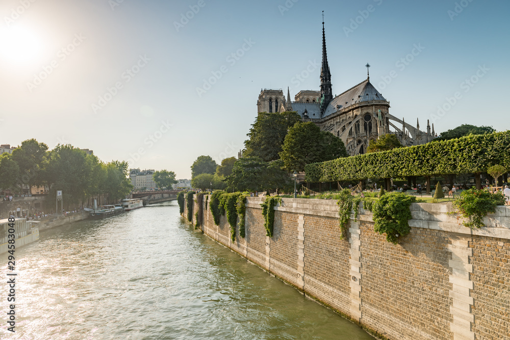 Notre Dame cathedral in Paris on bank of River Seine