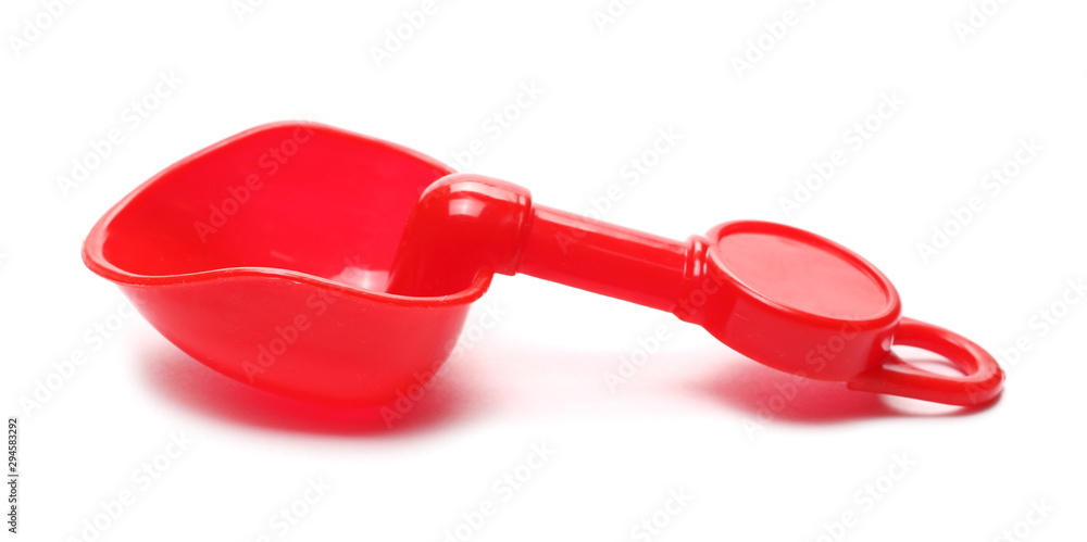 Plastic beach, garden toy for kids, plastic shovel isolated on white background Plastic beach, garden toy for kids, plastic shovel isolated on white background