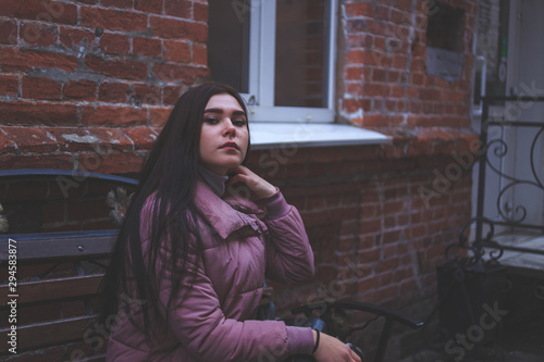 girl sitting on a bench