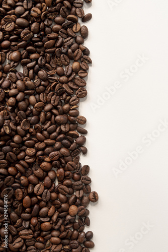 Contrasted coffee beans with white background