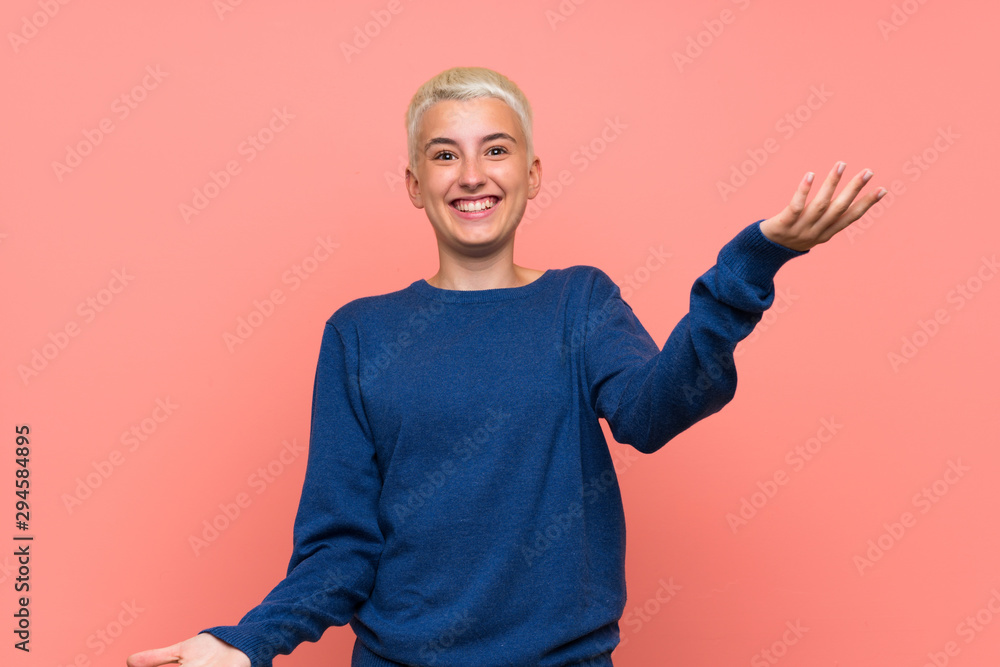 Teenager girl with white short hair over pink wall smiling Teenager girl with white short hair over pink wall smiling