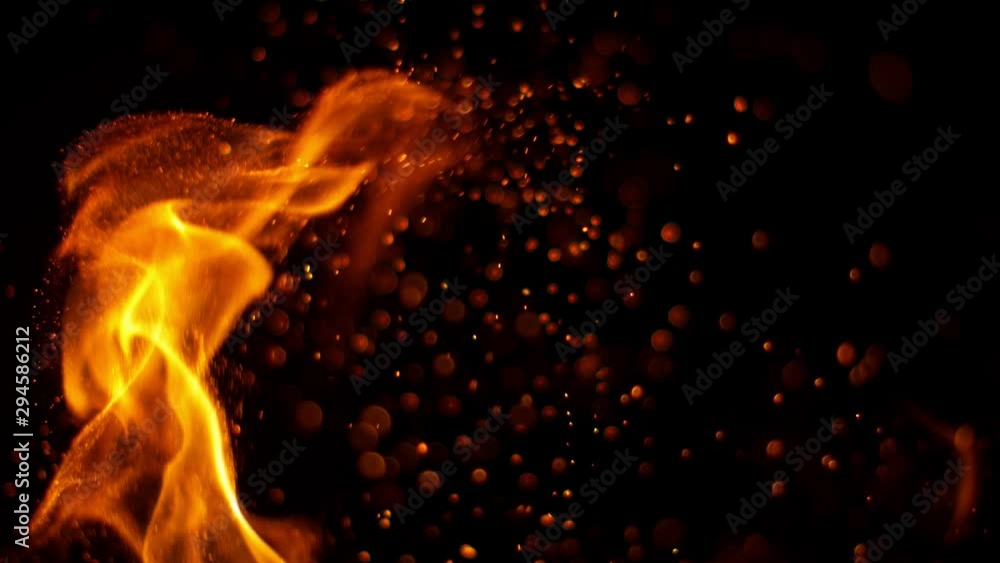 Super slow motion of fire sparks isolated on black background. Filmed on high speed camera, 1000 fps