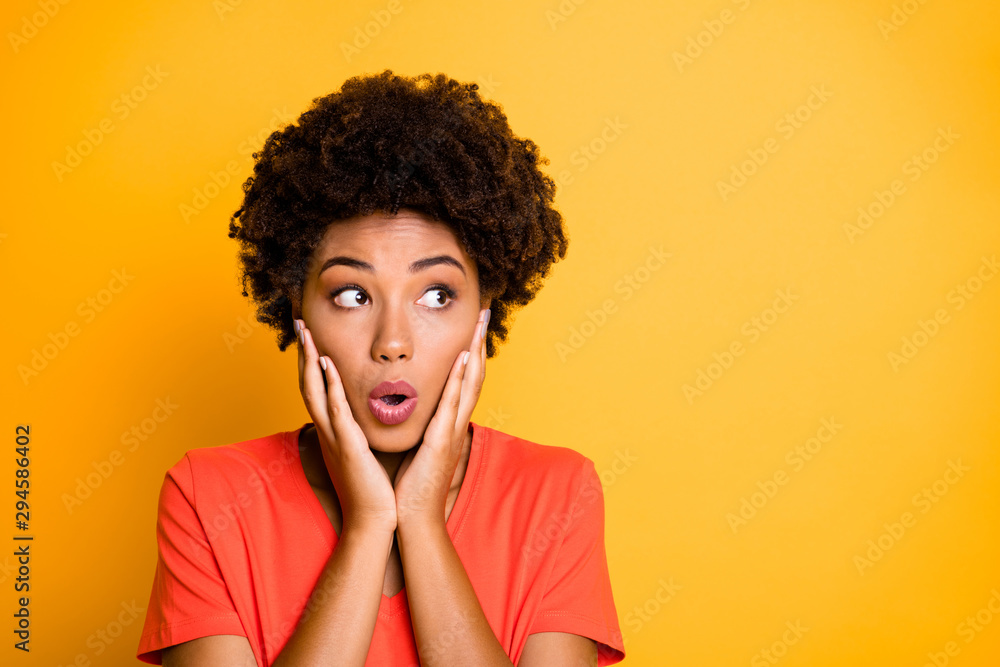 Photo of black afro american fearful girlfriend feeling guilty about something holding her cheeks with hands lips pouted isolated over yellow vibrant color background - obrazy, fototapety, plakaty 