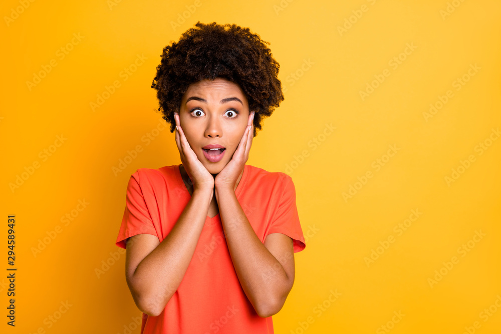 Photo of funny dark skin lady ready for cheap shopping not believe black friday low prices wear orange v neck t-shirt isolated yellow color background Photo of funny dark skin lady ready for cheap shopping not believe black friday low prices wear orange v neck t-shirt isolated yellow color background