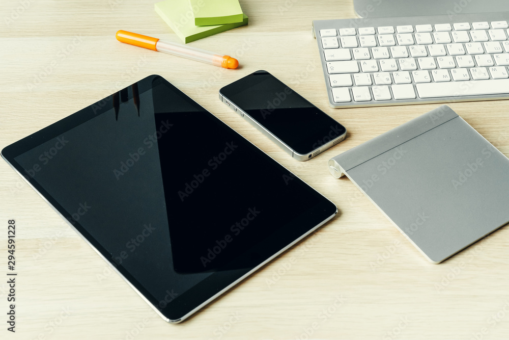 Close up shot of digital devices on office table Close up shot of digital devices on office table