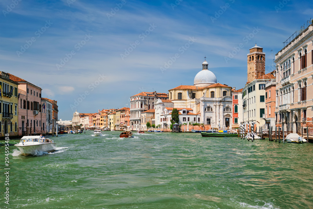 Boats and gondolas on Grand Canal in Venice, Italy