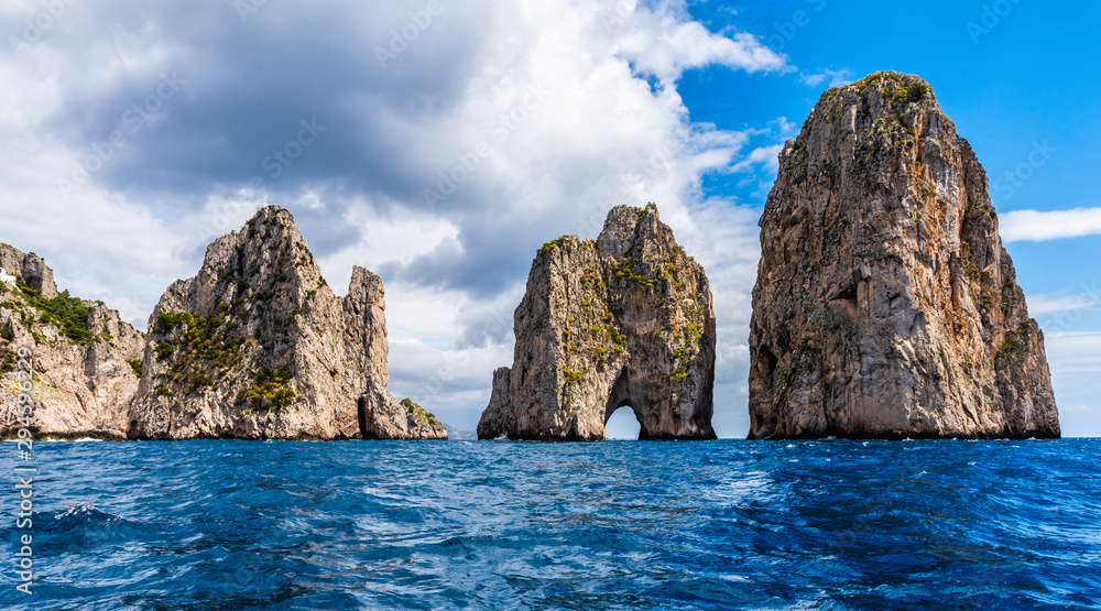 Faraglioni - 3 towering rocks off the coast of the Italian island of Capri