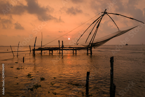 Chinese fishing nets at sunset, Kochi, Kerala, India © inigolaitxu