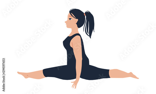 Young beautiful woman doing splits