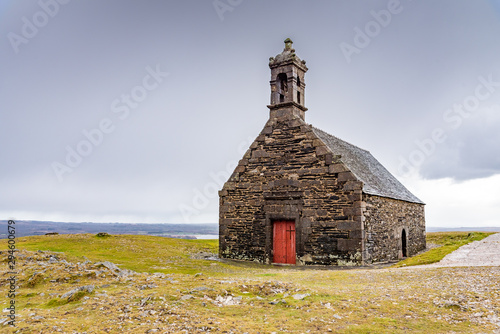 Papier peint The chapel Saint-Michel de Braspart is located on top of a hill that dominates Lake Brennilis and the region of the Monts d'Arrée