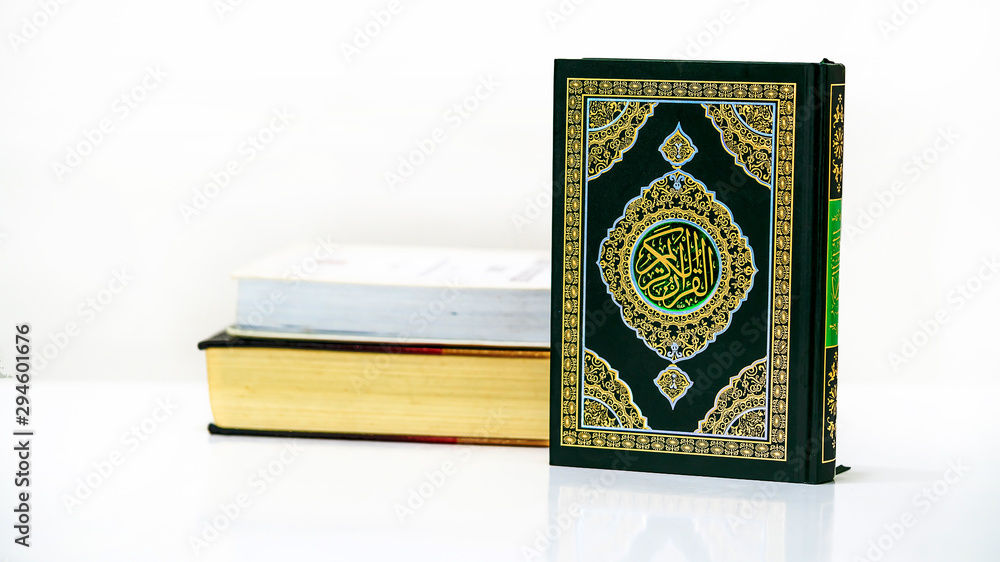 Islamic Concept - Isolated close up the holy Quran Islamic Concept - Isolated close up the holy Quran