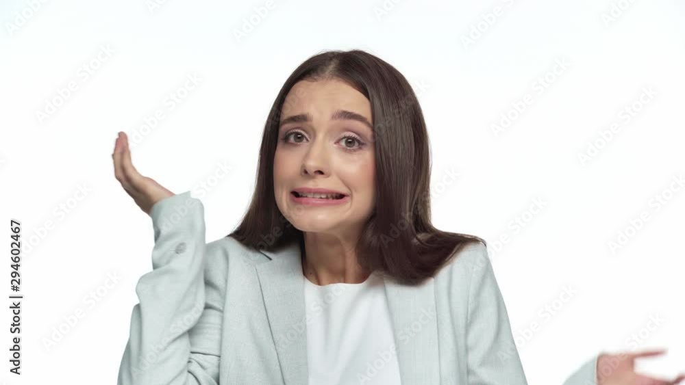 confused businesswoman showing shrug gesture isolated on white 