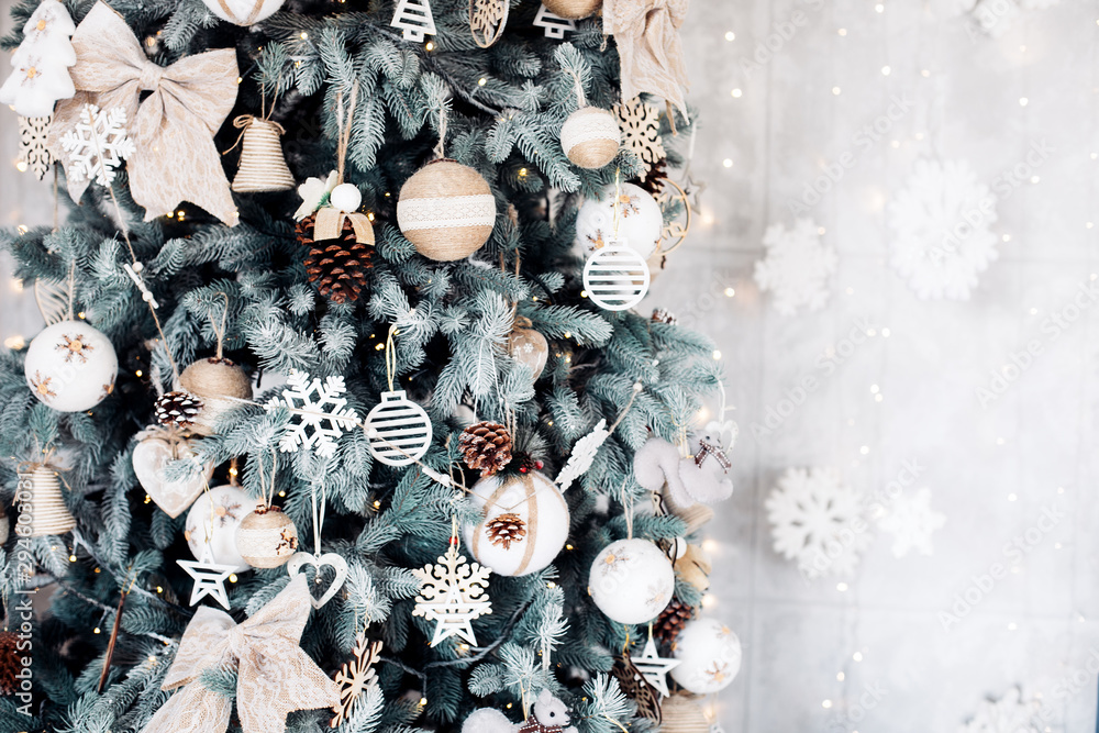 Fototapeta premium Christmas tree and Christmas decorations.Holiday background. New Year's decorations Close up.