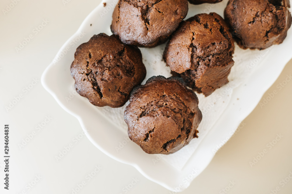 Chocolate homemade cupcakes muffins. in white plate