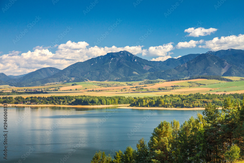 Landscape with The Low Tatras mountain range, view from the Liptovska Mara dam, Slovakia, Europe.