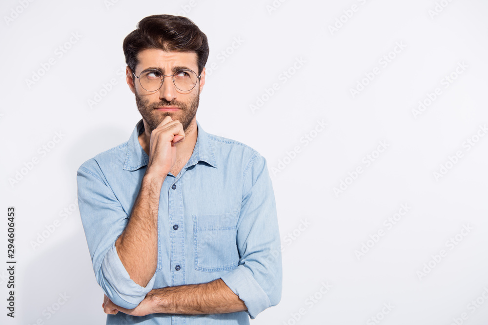 Photo of arabian amazing guy think over important business project speech for seminar wear specs casual denim shirt isolated white color background Photo of arabian amazing guy think over important business project speech for seminar wear specs casual denim shirt isolated white color background