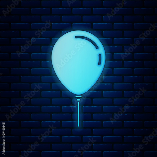 Glowing neon Balloon with ribbon icon isolated on brick wall background. Vector Illustration
