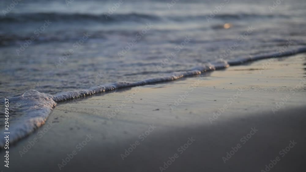feet leaving marks on the sand on the sea close up feet leaving marks on the sand on the sea close up