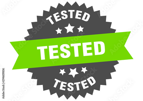 tested sign. tested green-black circular band label