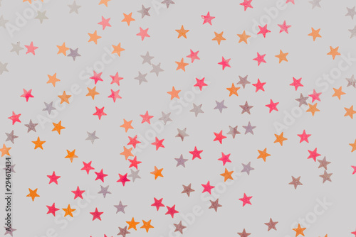 Star design wallpaper or wrapping paper style design with pastel coloured star pattern