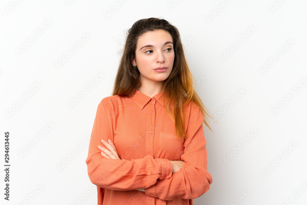 Young brunette girl over isolated white background portrait Young brunette girl over isolated white background portrait