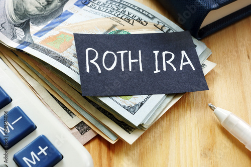 Conceptual hand written text showing ROTH IRA photo