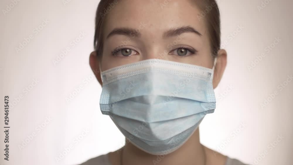 Young girl doctor close up shot. White background. Young girl doctor close up shot. White background.