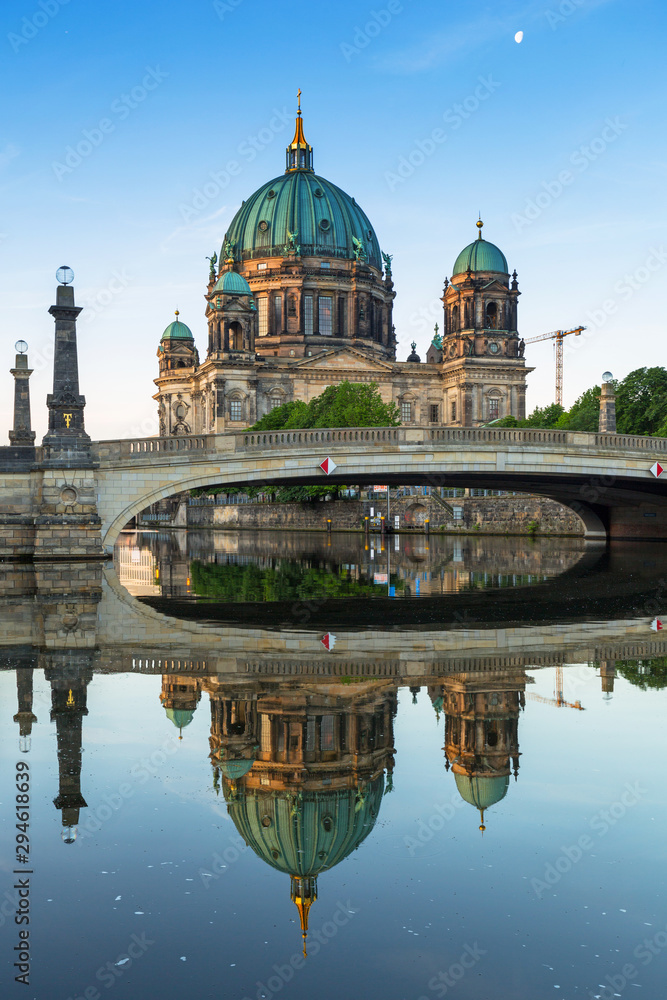 Berlin Cathedral reflected in Spree River at dawn, Germany