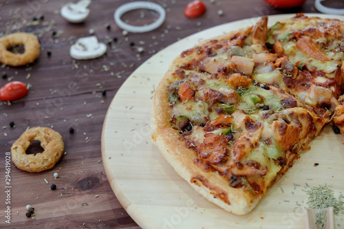 pizza with mushrooms and cheese on wood table