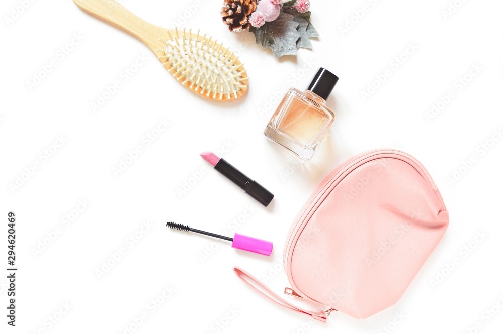 Flat lay photography beauty products and cosmetic bag. Hair brush, pink  lipstick, mascara, perfume bottle and cosmetic bag on a white background.  Items for winter holidays makeup Stock Photo | Adobe Stock