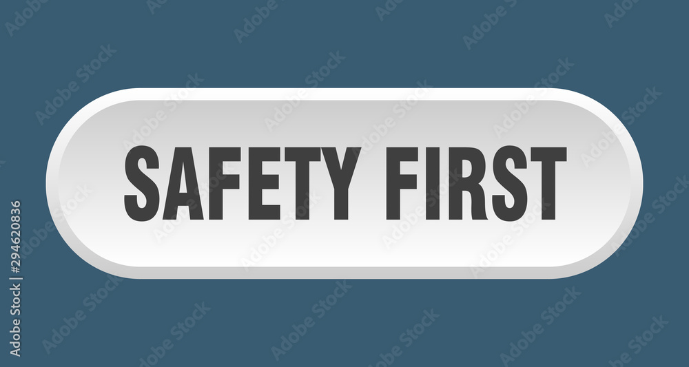safety first button. safety first rounded white sign. safety first