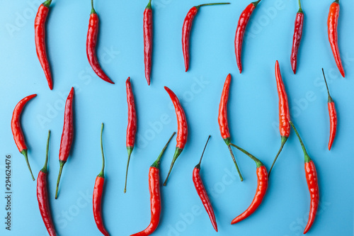 hot red pepper on a blue background.