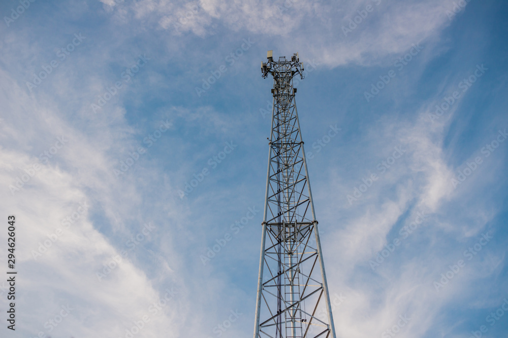 Telecommunication pole against the beautiful sky.copy space right Telecommunication pole against the beautiful sky.copy space right